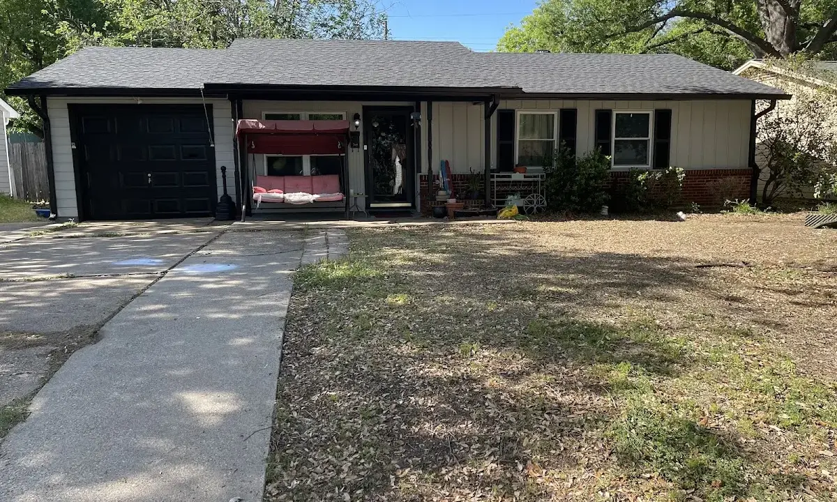 Asphalt Shingle Roof Repair crew at work on a residential roof in Longswamp
